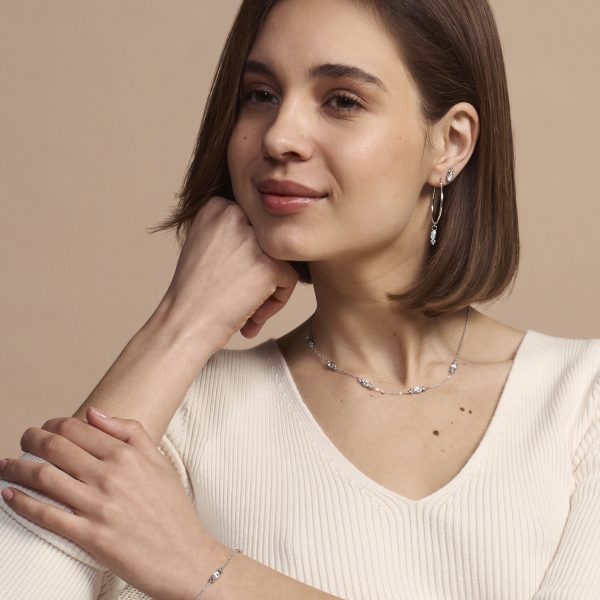 Dainty Silver Tone Stud Earrings - Image 4